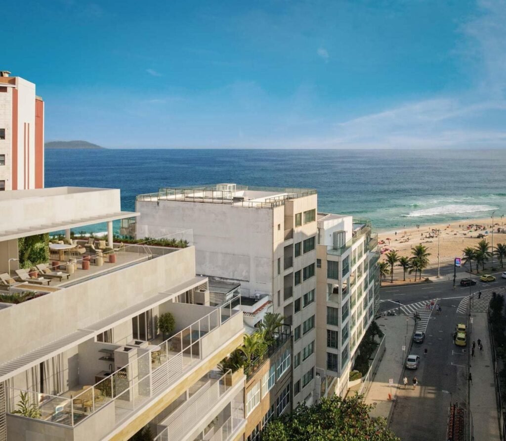 Modern beachfront apartments overlooking the sandy beach and Atlantic Ocean in Brazil.