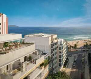 Modern beachfront apartments overlooking the sandy beach and Atlantic Ocean in Brazil.